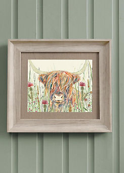 Alfie Highland Cow Framed Print by Voyage Maison