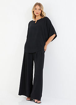 Black Crepe Palazzo Trousers by Quiz
