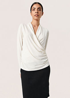 Columbine Long Sleeve Wrap Blouse by Soaked in Luxury