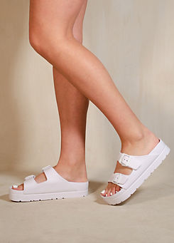 Danielle White Double Strap Buckle Sandals by Where’s That From
