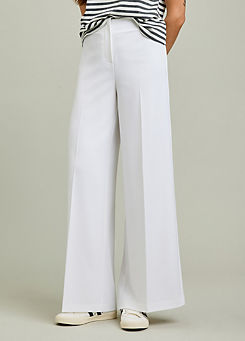 Relaxed White Wide Leg Trousers by Freemans