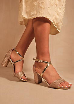 Ruth Gold Glitter Block Heel Sandals by Where’s That From