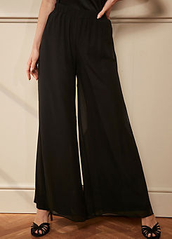 Split Overlay Trousers by Together