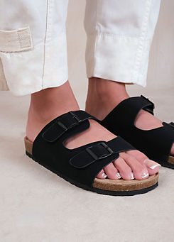 Willow Black Nubuck Two Strap Buckle Flat Sandals by Where’s That From