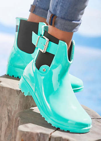 chelsea boots with buckle strap