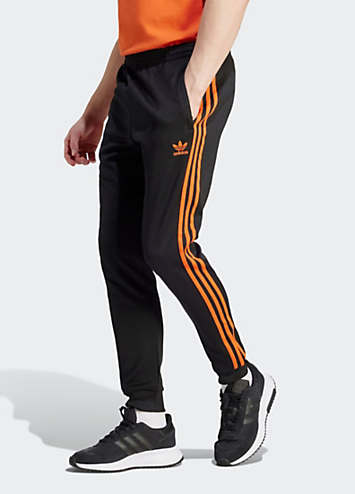 Black pants with cheap orange stripe