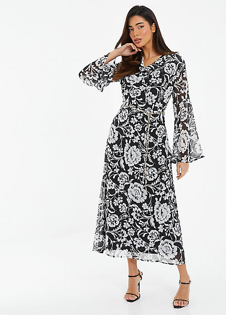 Black and white dress with store bell sleeves