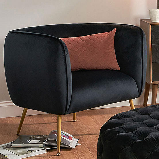 black velvet armchair with gold legs