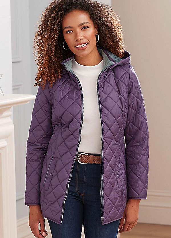 https://lookagain.scene7.com/is/image/OttoUK/600w/Purple-Fleece-Lined-Hooded-Quilted-Jacket-by-Cotton-Traders~70R823FRSP.jpg