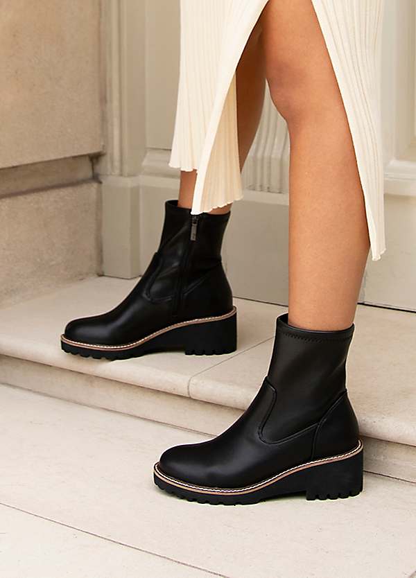 Trish Black Faux Leather Wedged Heel Ankle Boots by Linzi